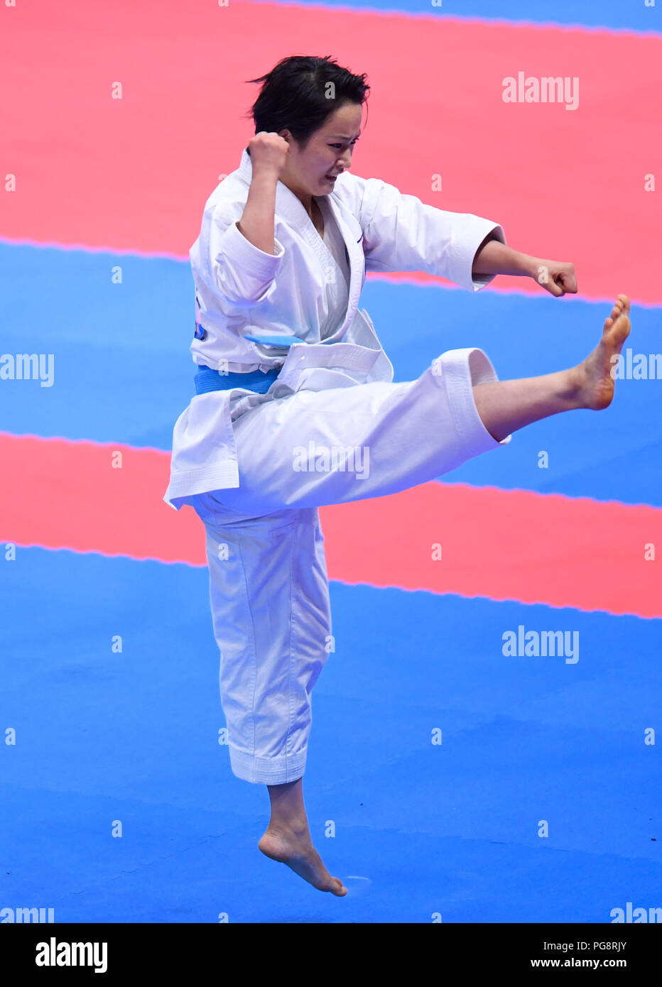 Jakarta, Indonesia. 25th Aug, 2018. Shimizu Kiyou of Japan competes during the women's Kata final contest at the 18th Asian Games in Jakarta, Indonesia, Aug. 25, 2018. Credit: Huang Zongzhi/Xinhua/Alamy Live News Stock Photo