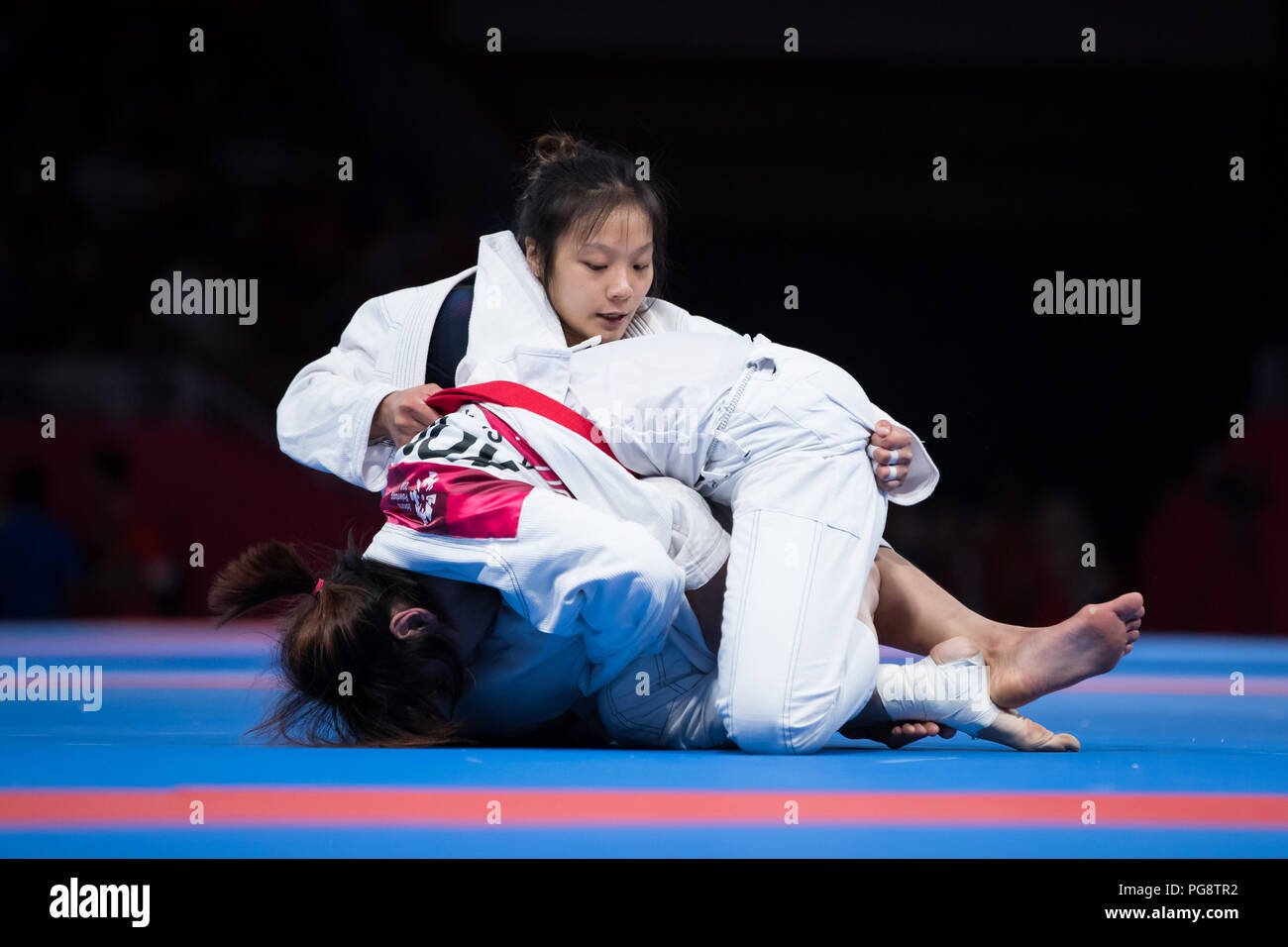 Jakarta Indonesia 25th Aug 2018 Sung Kira Below Of South Korea Competes Against Lien Tian En Constance Of Singapore During The Ju Jitsu Newaza Women S 62 Kg Final Gold Medal Contest At The