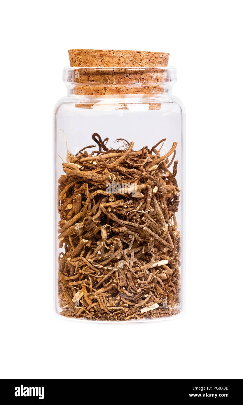 Valerian root in a bottle with cork stopper for medical use. Stock Photo