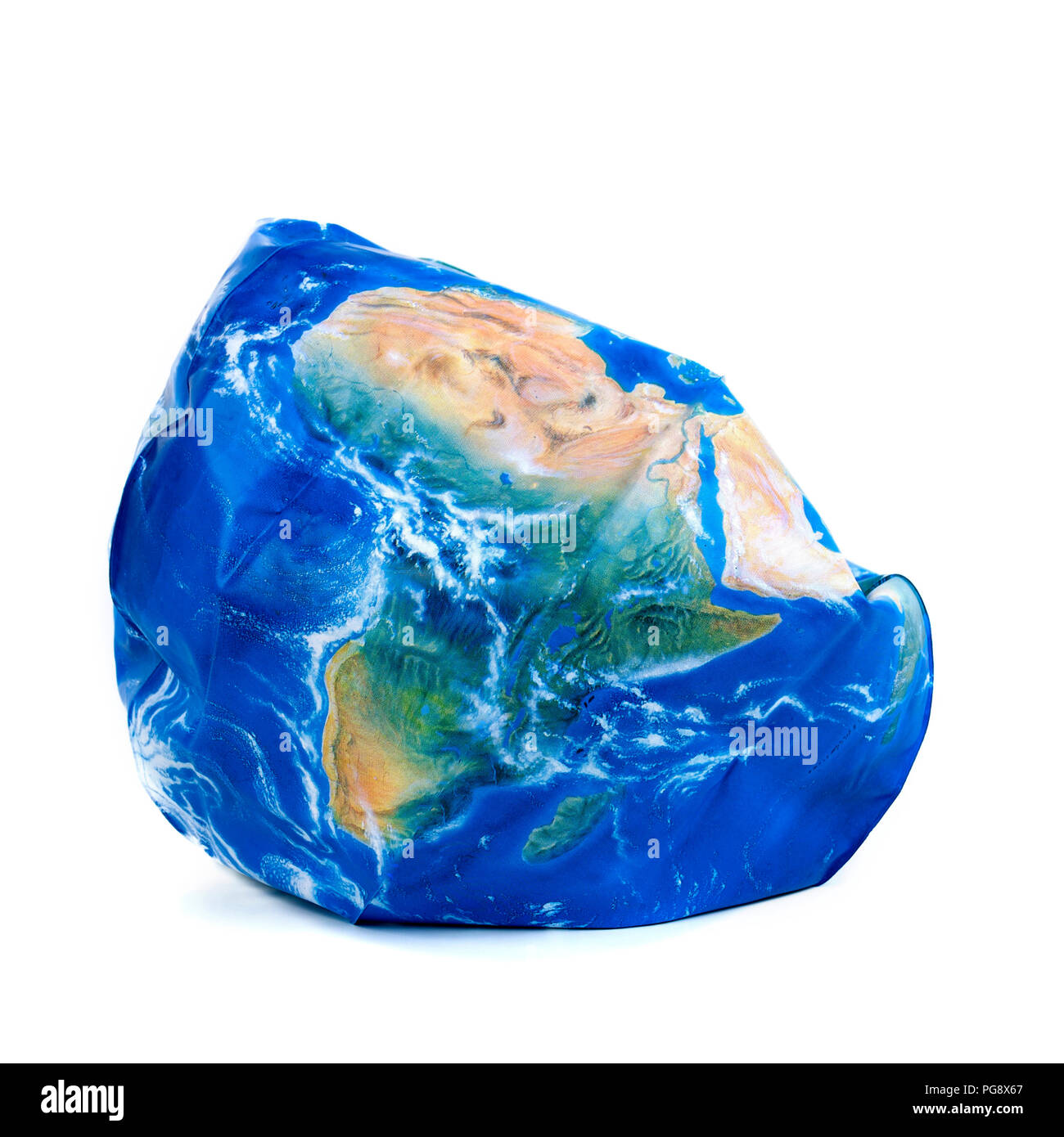 Deflated each ball in the shape of a globe, climate change concept Stock Photo