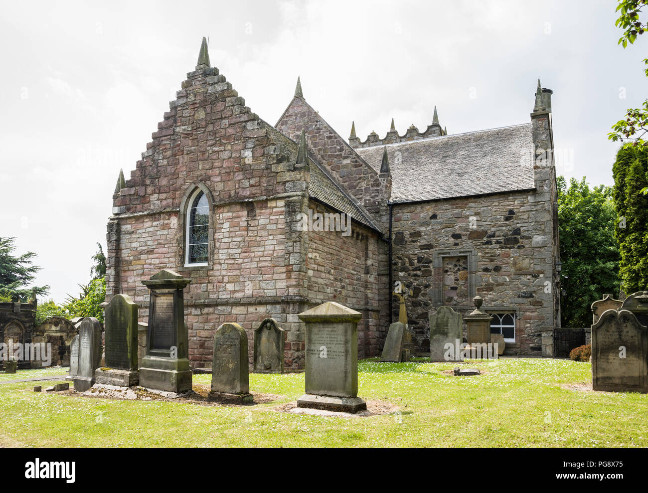Duddingston Kirk (1124) is a Parish Church in Duddingston Village in the East of Edinburgh, Scotland. Stock Photo