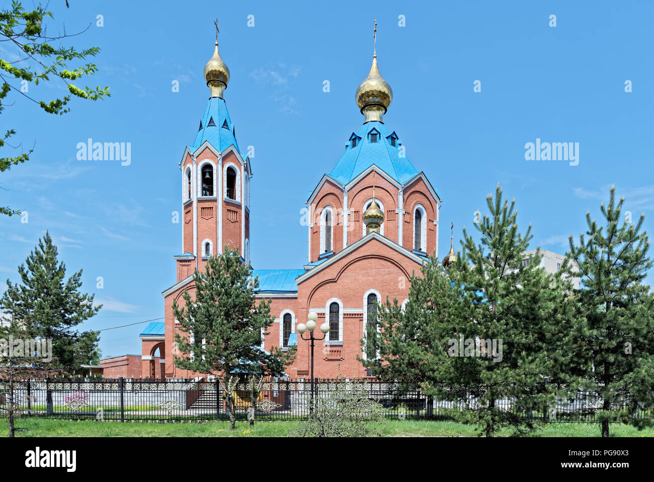 Cathedral of Our Lady of Kazan on sunny day against clear blue sky, Komsomolsk-on-Amur, Russia Stock Photo