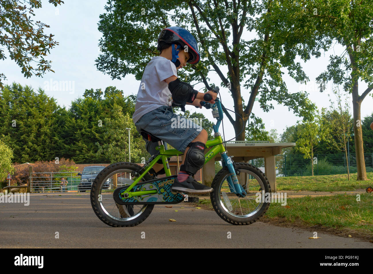 sticky-rail868: a boy wearing helmet riding motocross, digital art