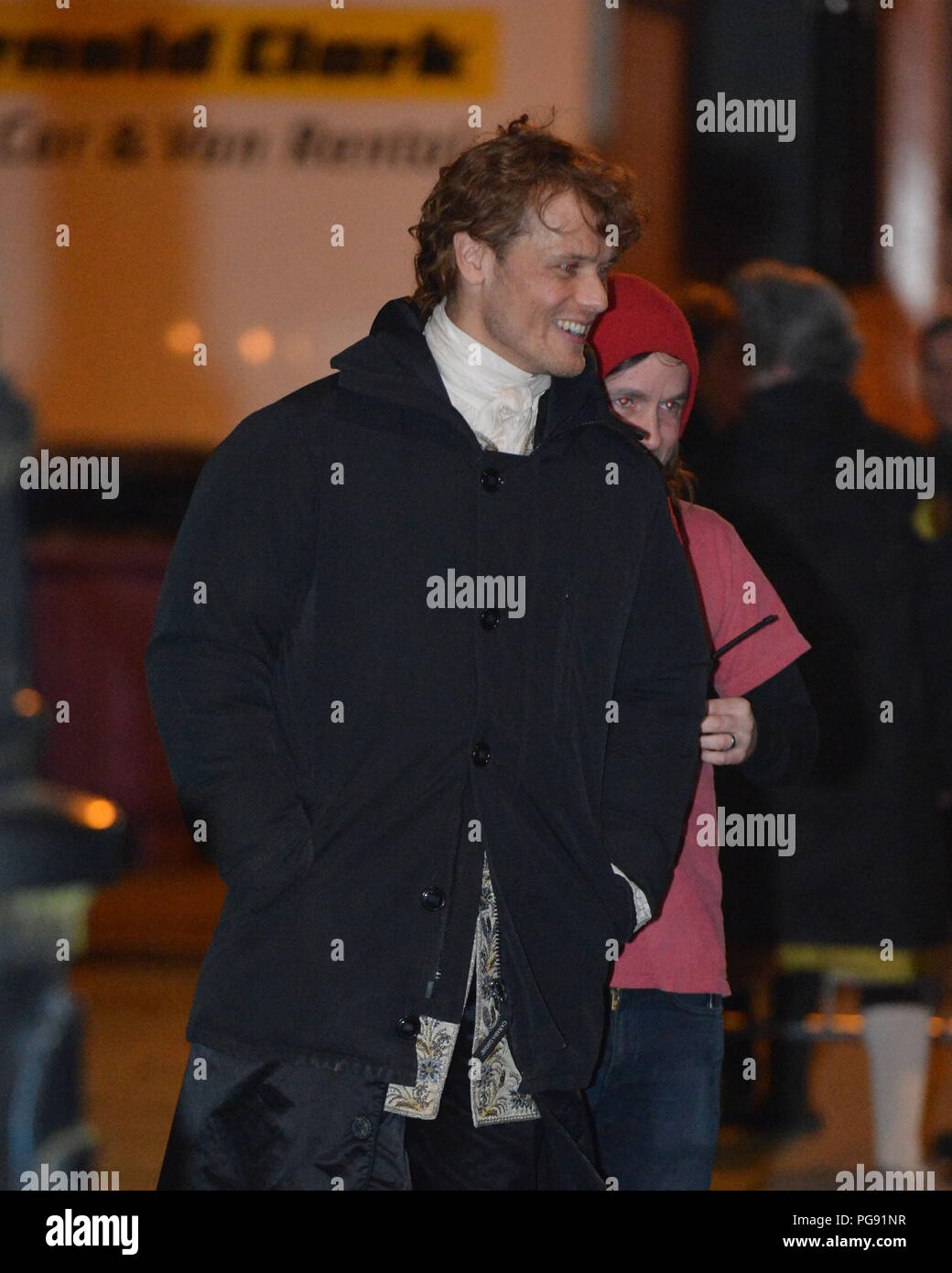 Outlander star Sam Heughan (plays the charachter of Jamie Fraser) meets and geets fans whilst filming in St Andrew's Square in Glasgow for the up and  Stock Photo