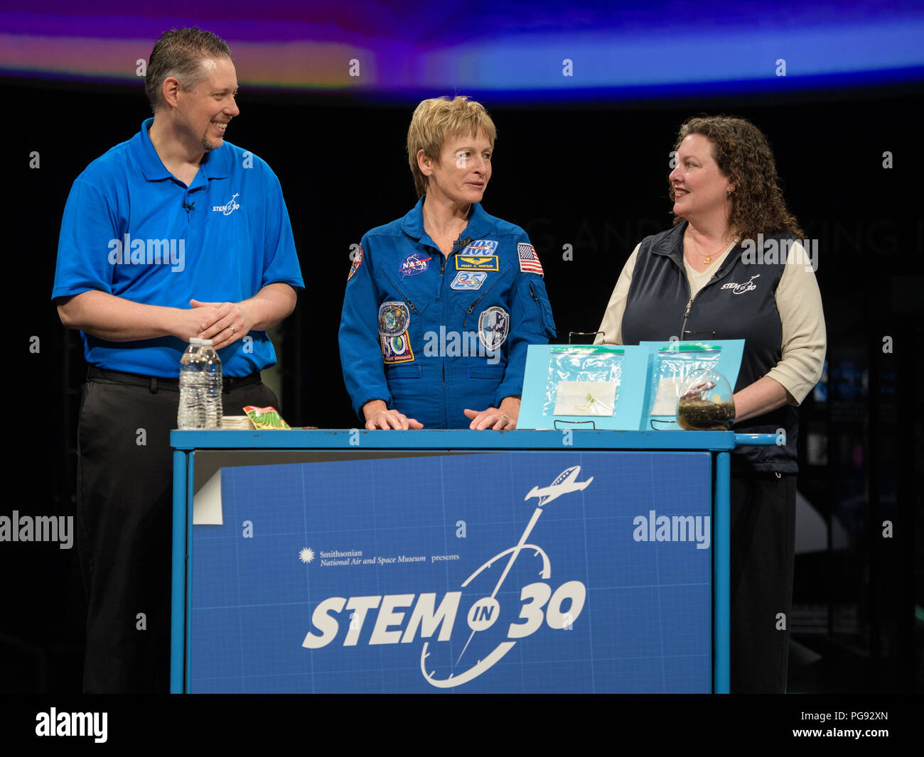 NASA astronaut Peggy Whitson tapes a segment for STEM in 30 with Marty Kelsey, left, and Beth Wilson, Friday, March 2, 2018 at the Smithsonian's National Air and Space Museum in Washington. Whitson spent 288 days onboard the International Space Station as a member of Expedition 50, 51, and 52, conducting four spacewalks and contributing to hundreds of experiments in biology, biotechnology, physical science and Earth science during her stay. Stock Photo
