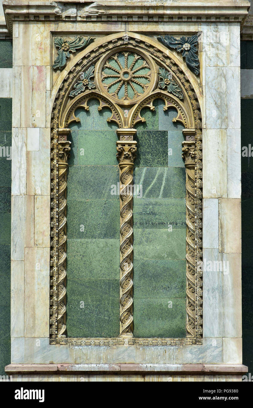 Detail from Saint Mary of the Flower southern facade with a false gothic window as decoration Stock Photo