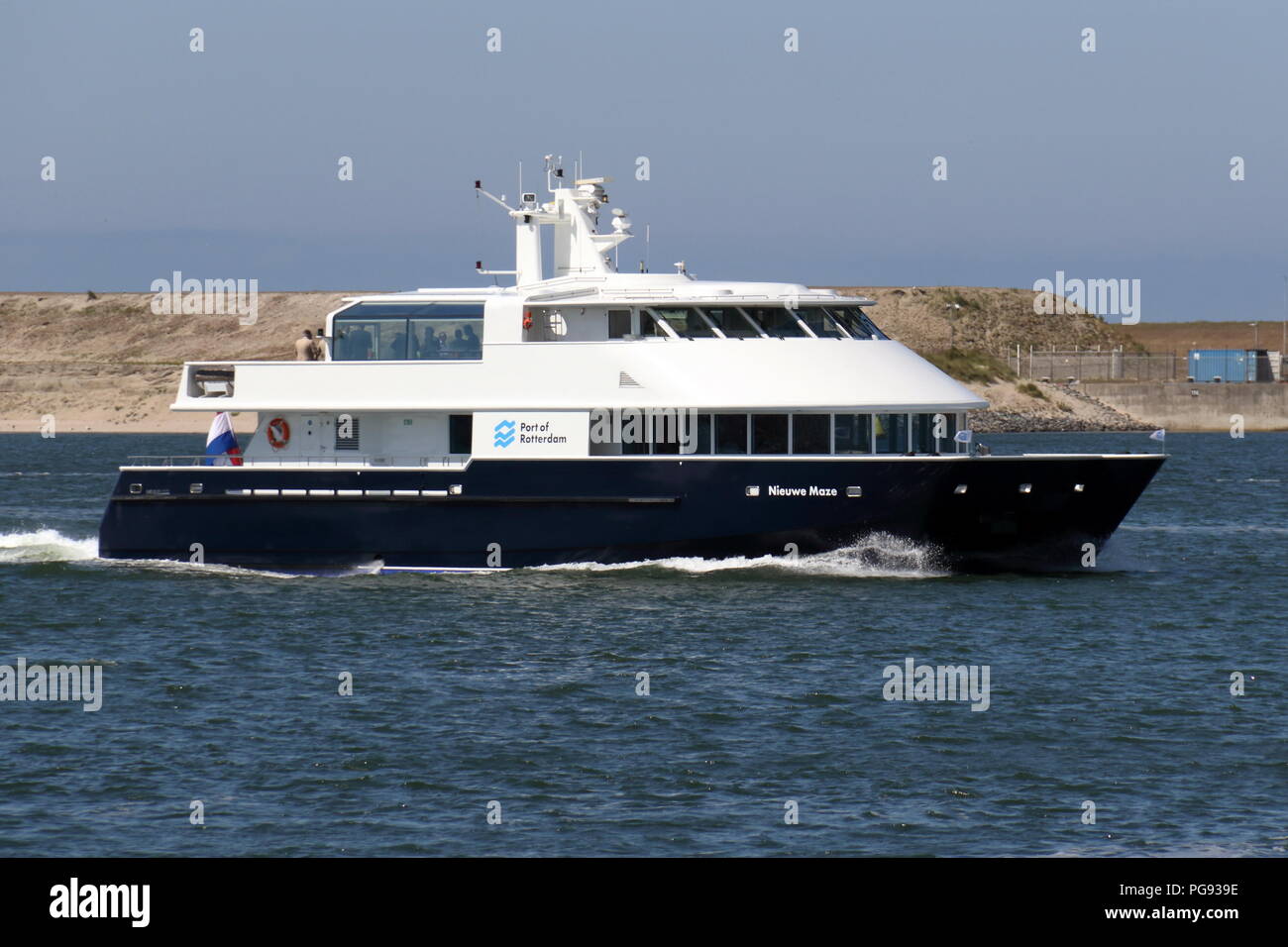 The round trip boat Nieuwe Maze will sail through the port of Rotterdam on July 13, 2018. Stock Photo