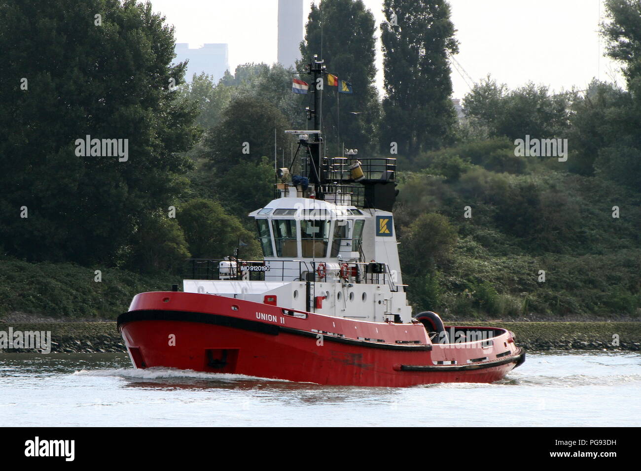 The harbor tug Union 11 leaves the port of Rotterdam on 13 July 2018. Stock Photo