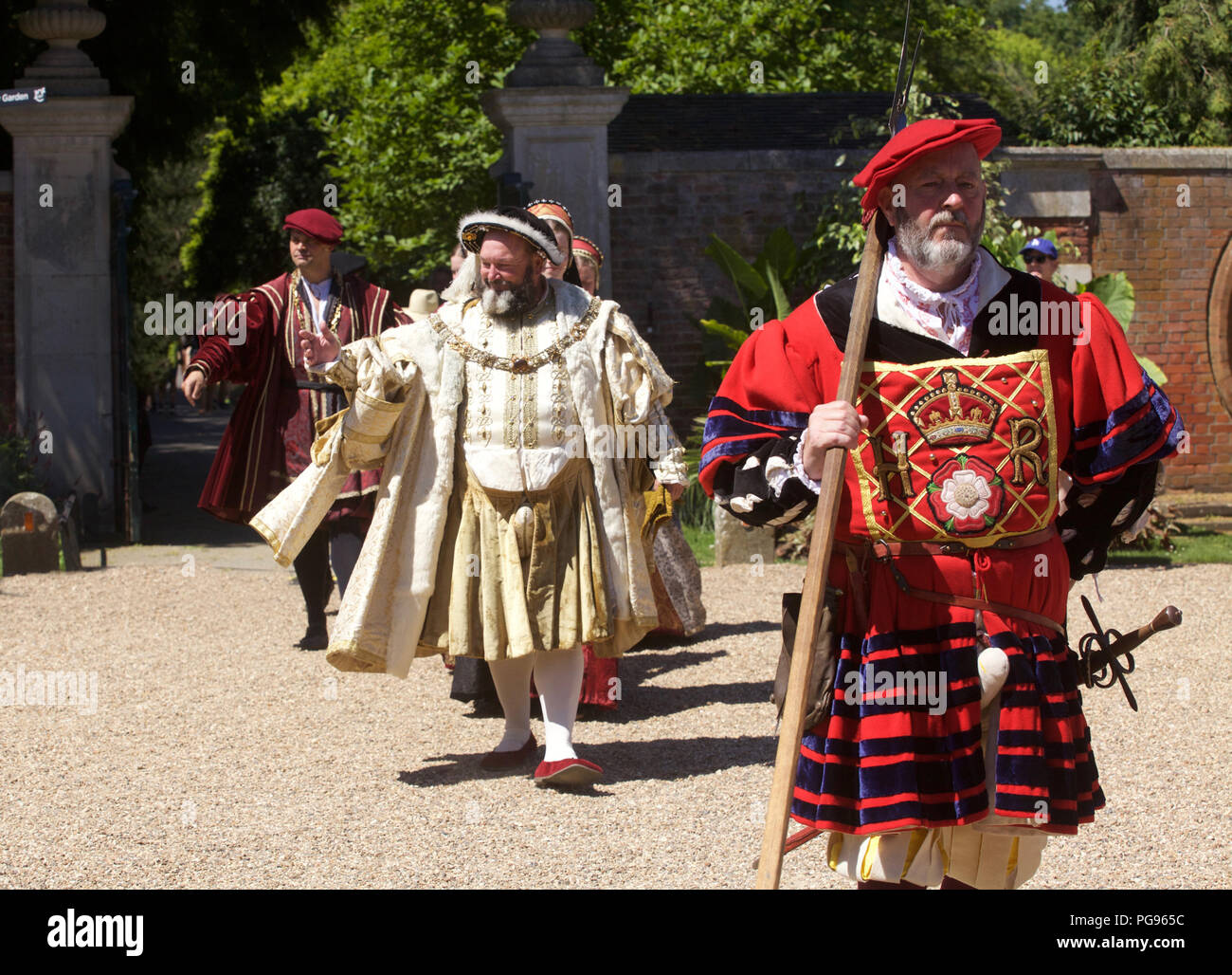 KIng Henry Eigth and courtiers (played by actors at Hamton Court Place London) Stock Photo