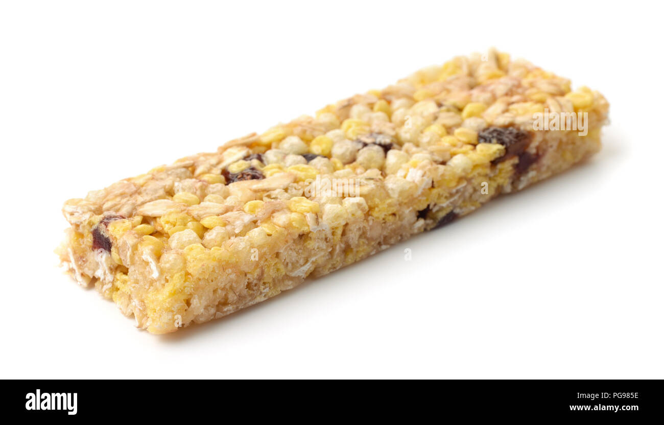 Healthy muesli bar made of cereals, honey and dried berries isolated on