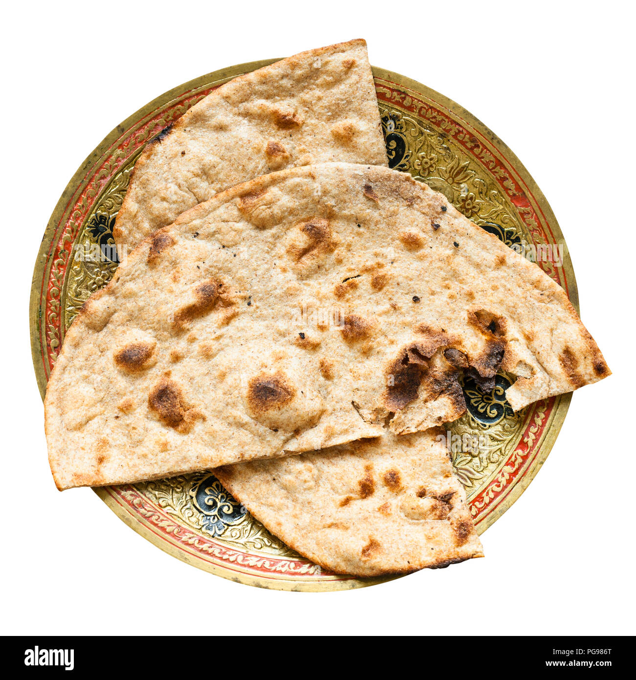 Tanoor Roti Indian cuisine - Tandoori Roti whole wheat flat bread on brass plate ...