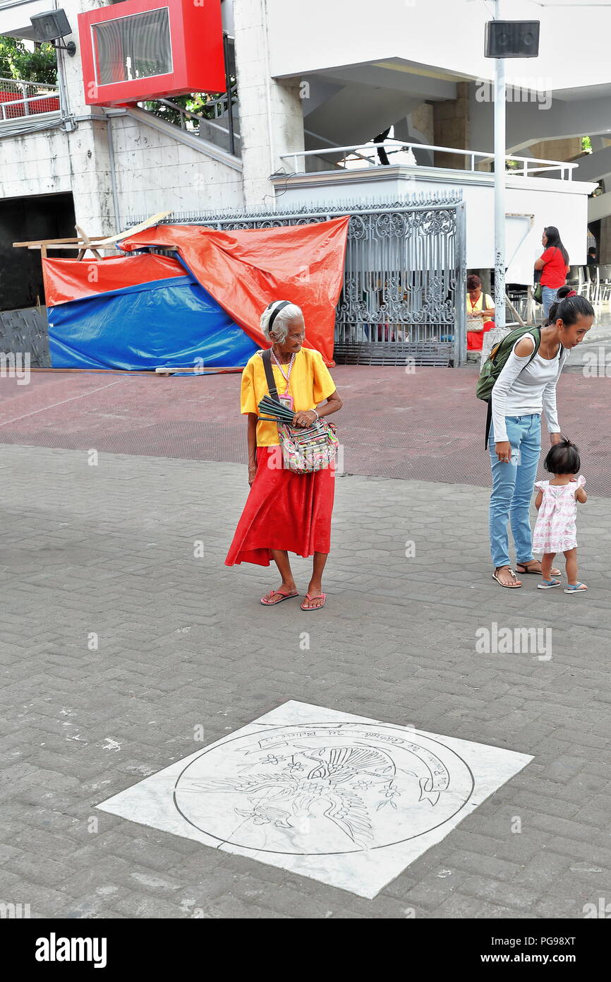 Cebu, Philippines-October 18, 2016: Filipino street saleswoman of