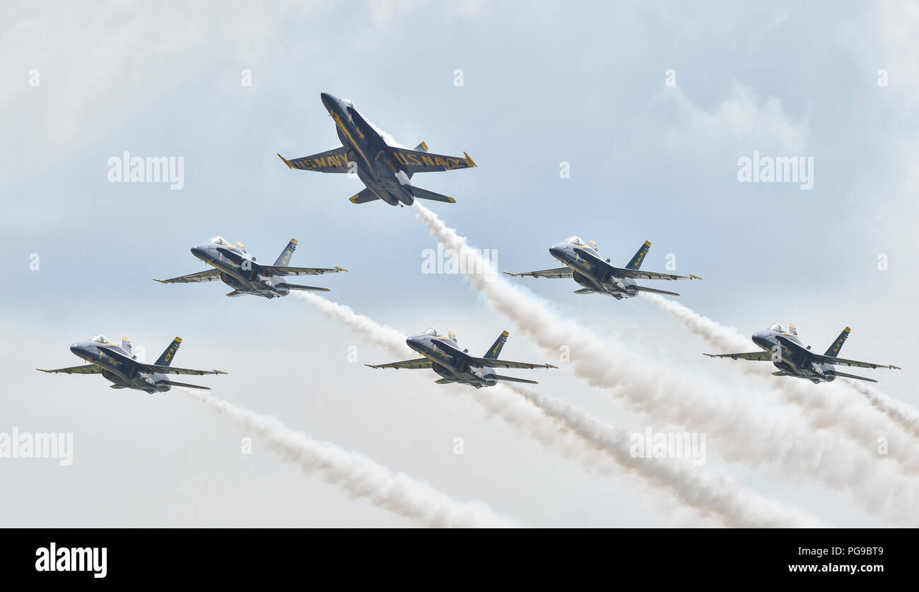 180818-N-UK306-1486 TERRE HAUTE, Indiana. (August 18, 2018) The U.S. Navy Flight Demonstration Squadron, the Blue Angels, Delta pilots perform the Pitch Up Break maneuver during a demonstration at the 2018 Terre Haute Air Show. The Blue Angels are scheduled to perform more than 60 demonstrations at more than 30 locations across the U.S. and Canada in 2018. (U.S. Navy photo by Mass Communication Specialist 2nd Class Timothy Schumaker/Released) Stock Photo