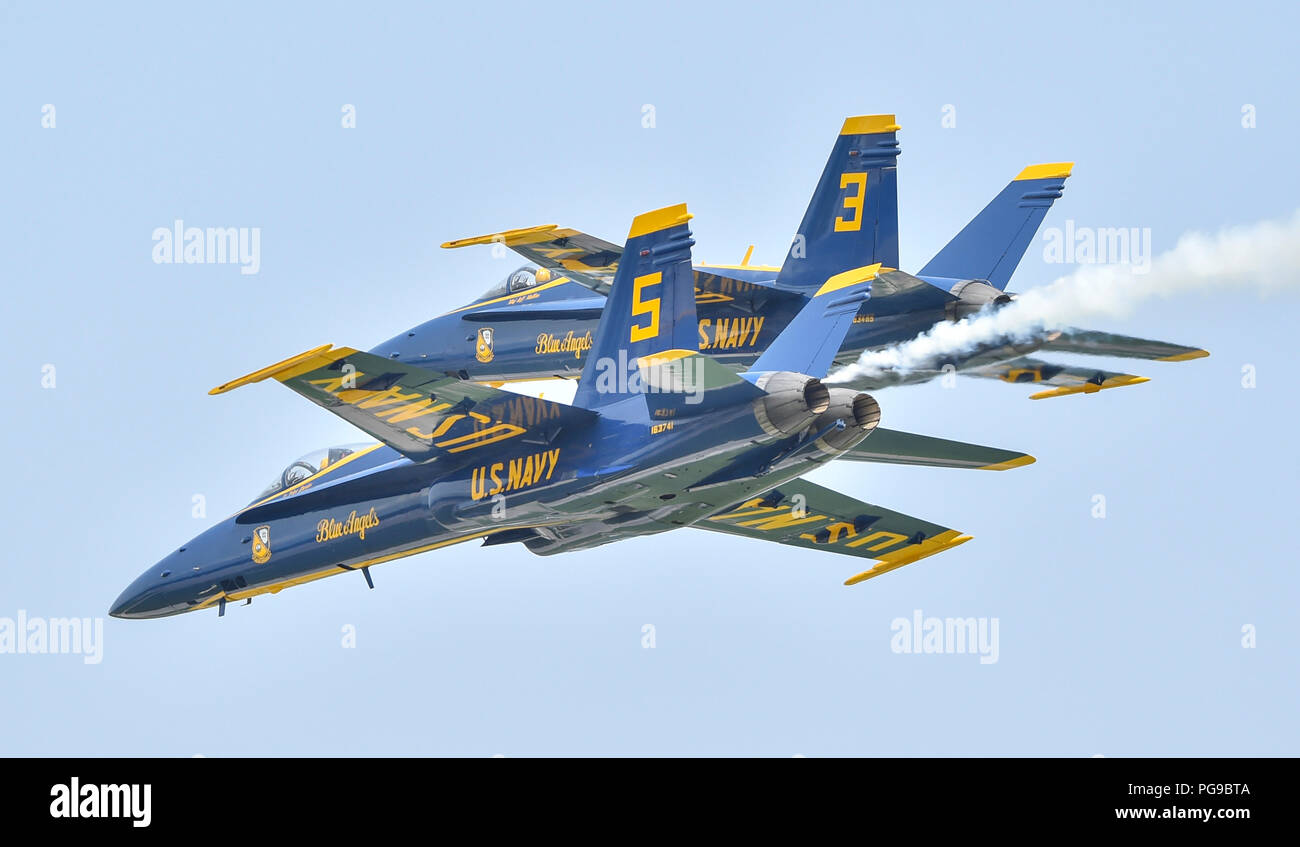 180818-N-UK306-1492 TERRE HAUTE, Indiana. (August 18, 2018) The U.S. Navy Flight Demonstration Squadron, the Blue Angels, pilots perform the Pitch Up Break during a demonstration at the 2018 Terre Haute Air Show. The Blue Angels are scheduled to perform more than 60 demonstrations at more than 30 locations across the U.S. and Canada in 2018. (U.S. Navy photo by Mass Communication Specialist 2nd Class Timothy Schumaker/Released) Stock Photo