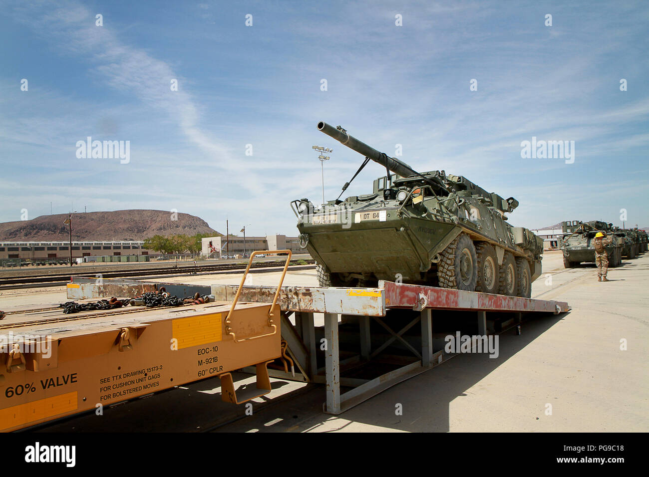 Stryker vehicles from the 56th Stryker Brigade Combat Team, 28th Infantry Division, Pennsylvania Army National Guard are made ready for train transportation at Yermo, California, Aug. 20. The tactical vehicles were used during the 56th SBCT’s training rotation at the National Training Center, Fort Irwin, California and will be shipped to Mechanicsburg, Pennsylvania and later returned to the 56th SBCT.  (U.S. Army National Guard Photo by Cpl. Hannah Baker/released) Stock Photo