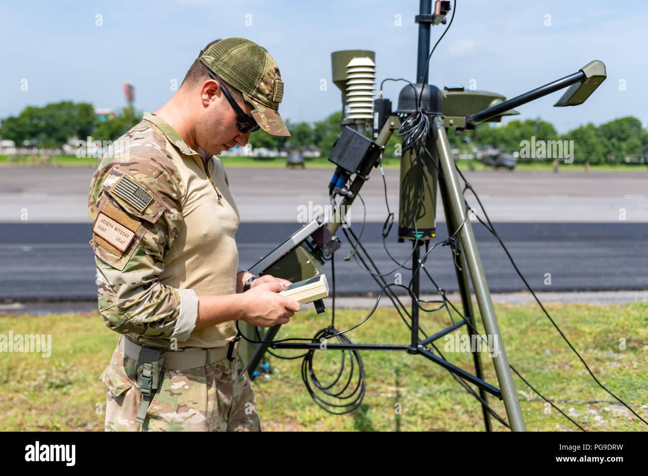 U.S. Air Force Staff Joseph Witschy, a weather specialist from ...