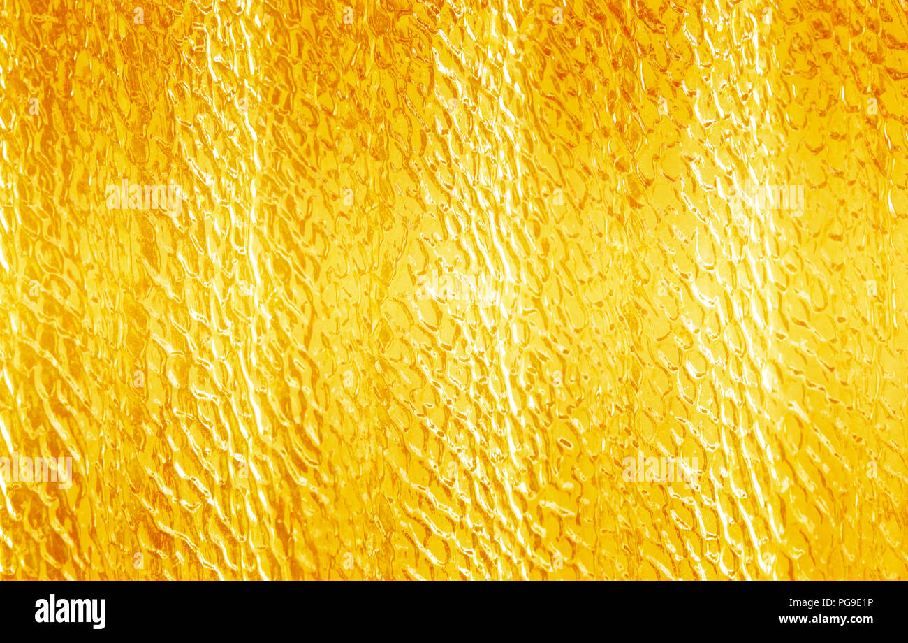 Shiny yellow leaf gold foil texture background/ Stock Photo