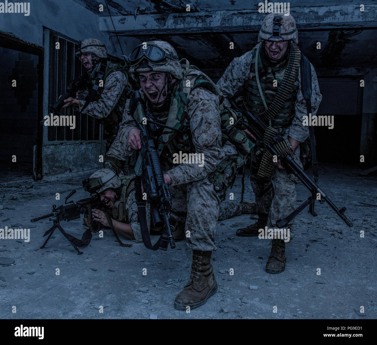 Marine Corps soldier fighters breakthrough with firefight Stock Photo