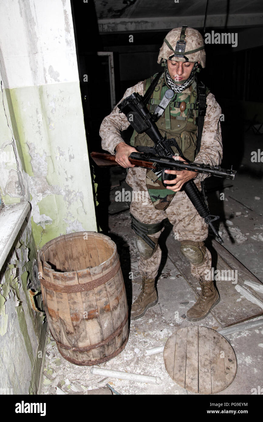 Counter terrorist team member found illegal weapon Stock Photo