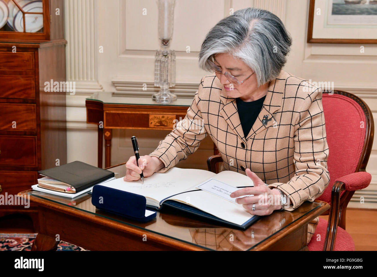 Republic of Korea Foreign Minister Kang Kyung-wha signs the guestbook before meeting Deputy Secretary of State John Sullivan at the U.S. Department of State in Washington, D.C. on March 16, 2018. Stock Photo