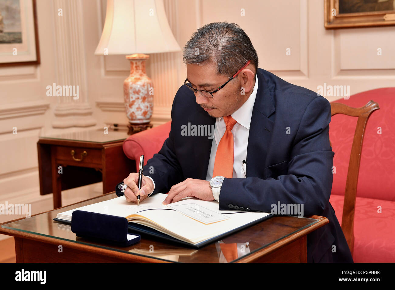 Brunei Second Minister Of Foreign Affairs And Trade Dato Seri Paduka Erywan Yusof Sign The Department Of State Guestbook Before His Meeting With Deputy Secretary Of State John Sullivan At The U S