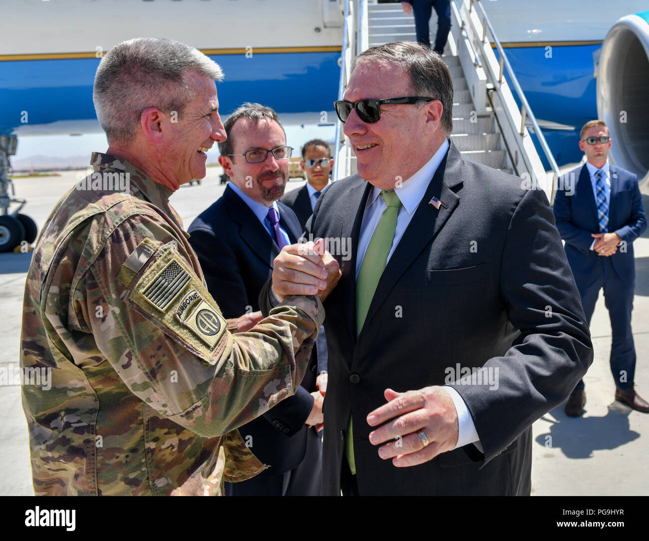 U.S. Secretary of State Michael R. Pompeo is greeted by General John Nicholson upon arrival to Bagram Airfield on July 9, 2018. Stock Photo