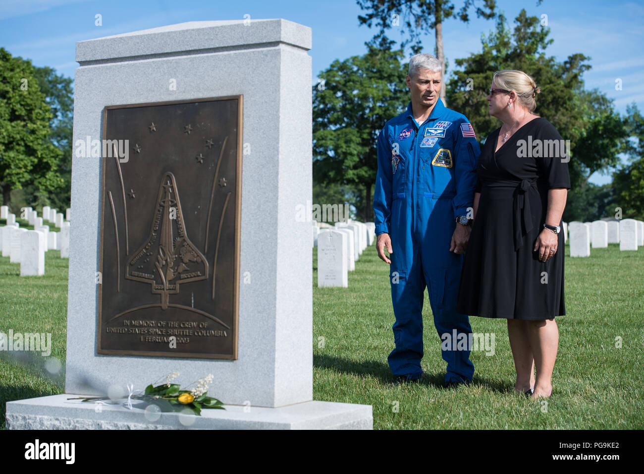 NASA astronaut Mark Vande Hei, left, and his wife Julie visit the Space Shuttle Columbia memorial, Friday, June 15, 2018 at Arlington National Cemetery in Arlington, Va. Stock Photo