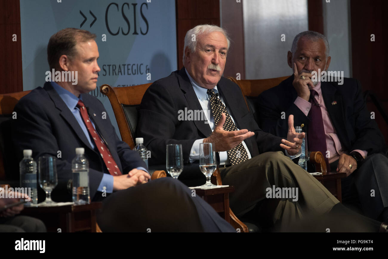 Former NASA Administrator Sean O'Keefe, second from right, answers a question during a panel discussion with NASA Administrator Jim Bridenstine and former NASA Administrator Charles Bolden at an event celebrating NASA's 60th anniversary at the Center for Strategic and International Studies on Monday, July 23, 2018 in Washington. Bridenstine, O'Keefe, and Bolden answered questions about the past and future of the agency. ( Stock Photo
