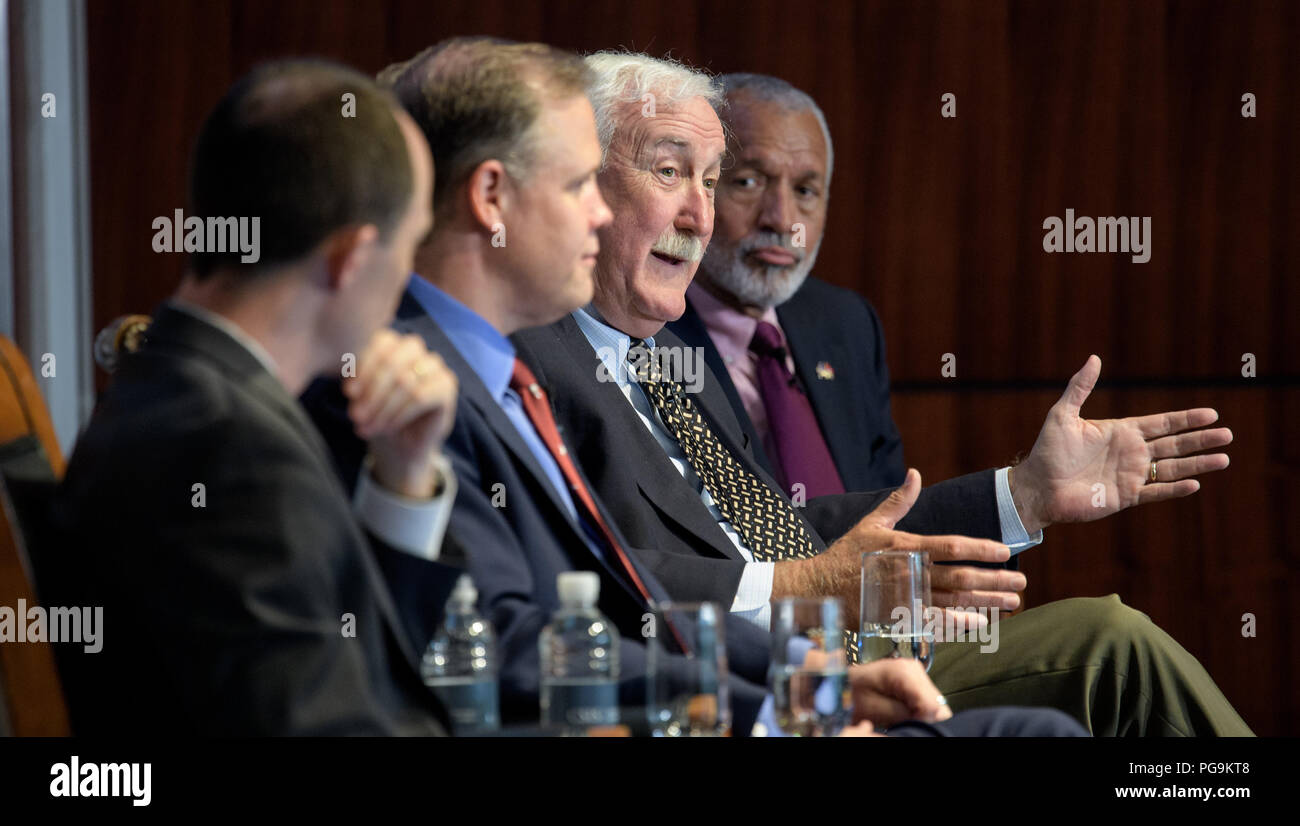 Former NASA Administrator Sean O'Keefe, second from right, answers a question during a panel discussion with NASA Administrator Jim Bridenstine and former NASA Administrator Charles Bolden at an event celebrating NASA's 60th anniversary at the Center for Strategic and International Studies on Monday, July 23, 2018 in Washington. Bridenstine, O'Keefe, and Bolden answered questions about the past and future of the agency. ( Stock Photo