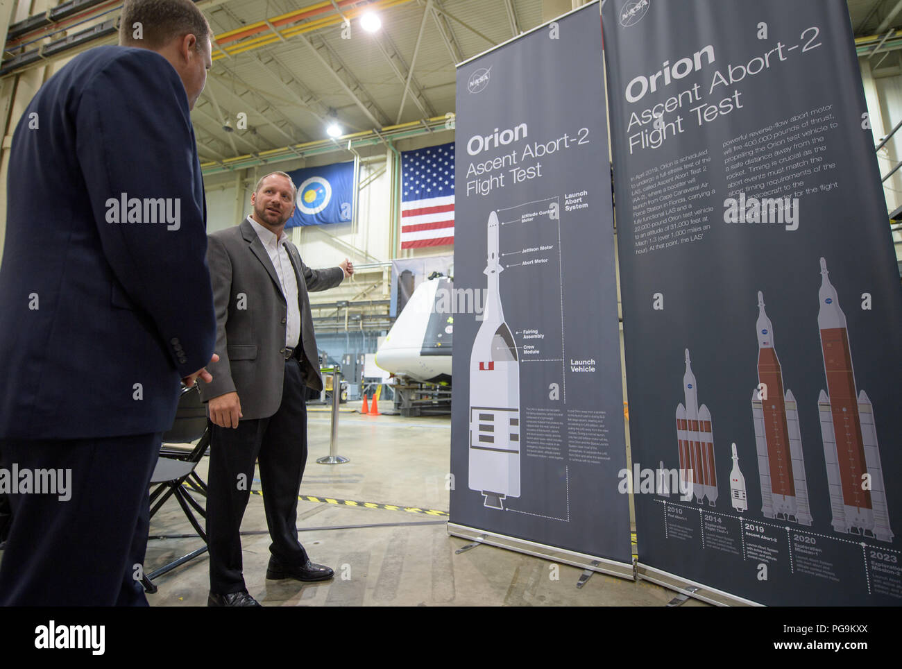 NASA Orion AA-2 Crew Module Manager Dr. Jon Olansen, right, talks to NASA Administrator Jim Bridenstine outside of the Orion test crew capsule that will be used for the Ascent Abort-2 (AA-2) test, Thursday, Aug. 2, 2018 at NASA’s Johnson Space Center in Houston, Texas. Stock Photo