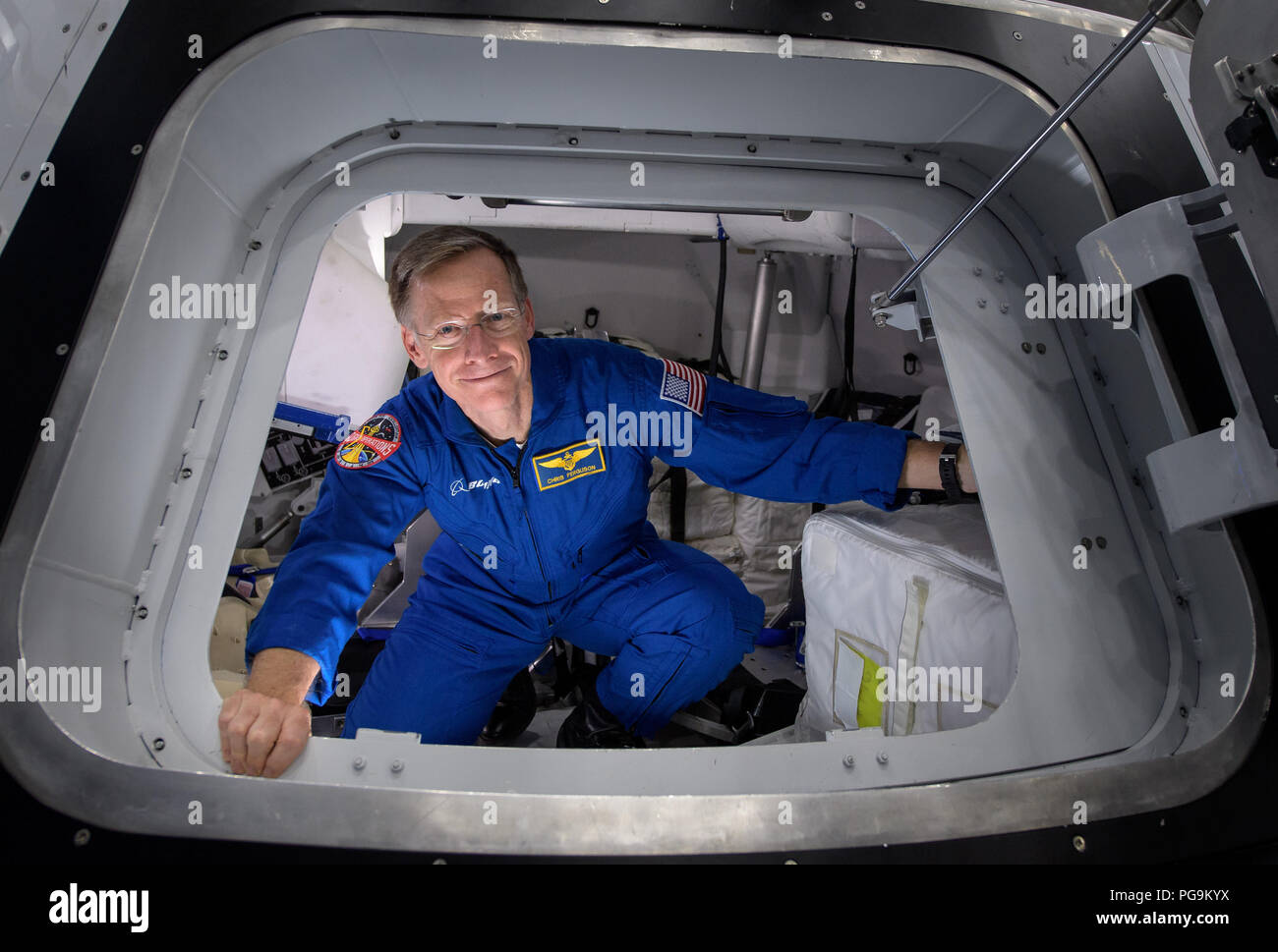 Boeing astronaut Chris Ferguson poses for a photograph as he exits the Boeing Mockup Trainer at NASA’s Johnson Space Center in Houston, Texas on Aug. 2, 2018 ahead of the commercial crew flight assignments announcement Aug. 3. Ferguson, along with NASA astronauts Eric Boe and Nicole Aunapu Mann were assigned to launch aboard Boeing’s CST-100 Starliner on the company’s Crew Flight Test targeted for mid-2019 in partnership with NASA’s Commercial Crew Program. Stock Photo