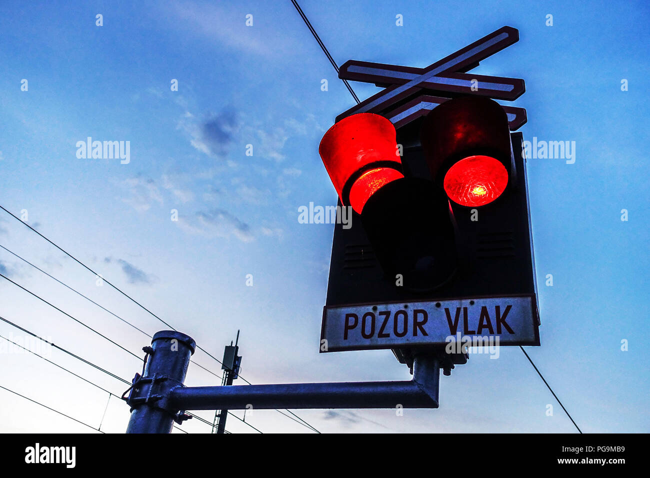 Flashing signal lights at railroad crossing, Czech Republic, Europe Railroad Lights Stock Photo