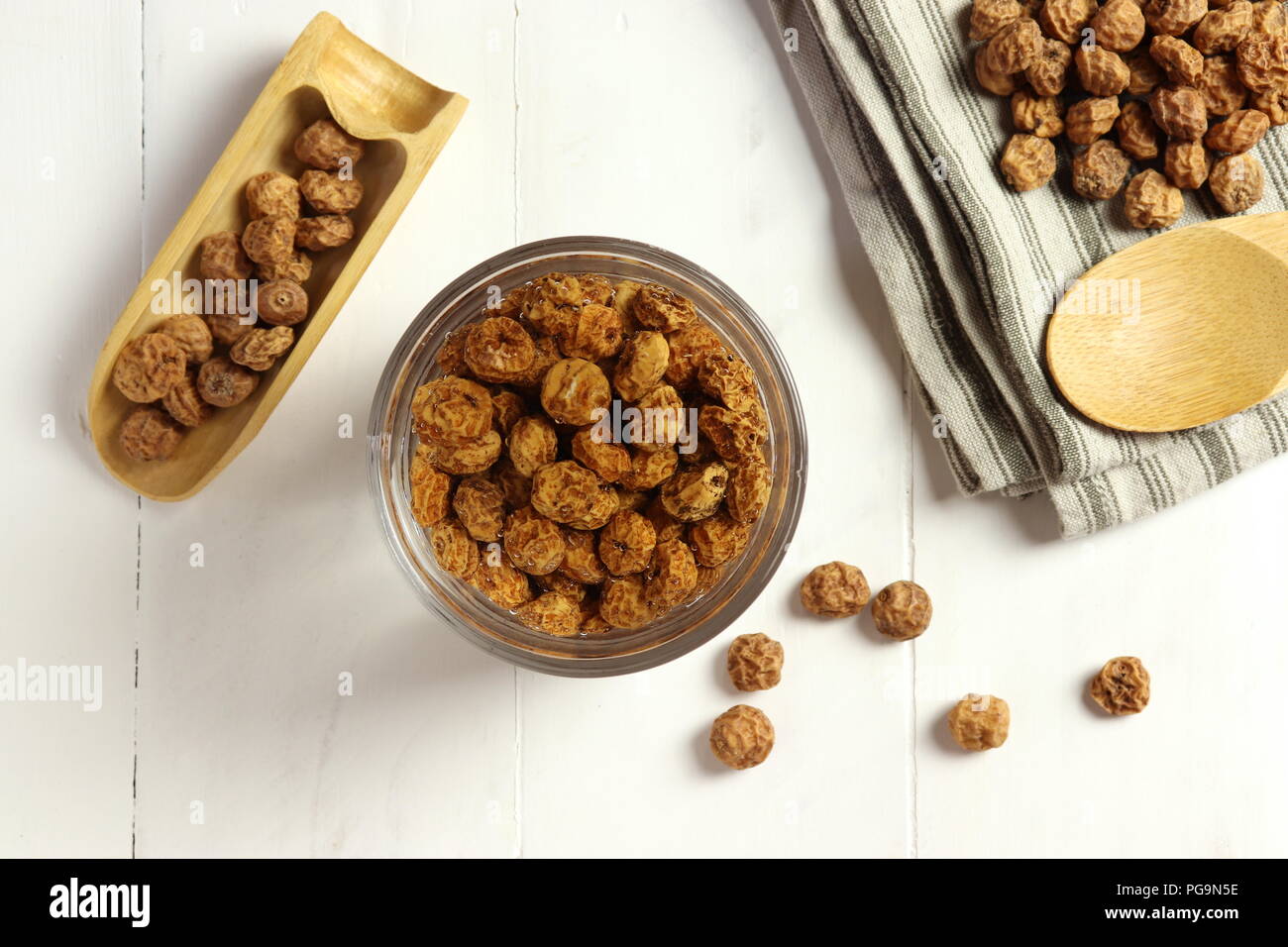 Soaking tigernuts before preparing horchata, non dairy milk typical for Valencia, top view Stock Photo