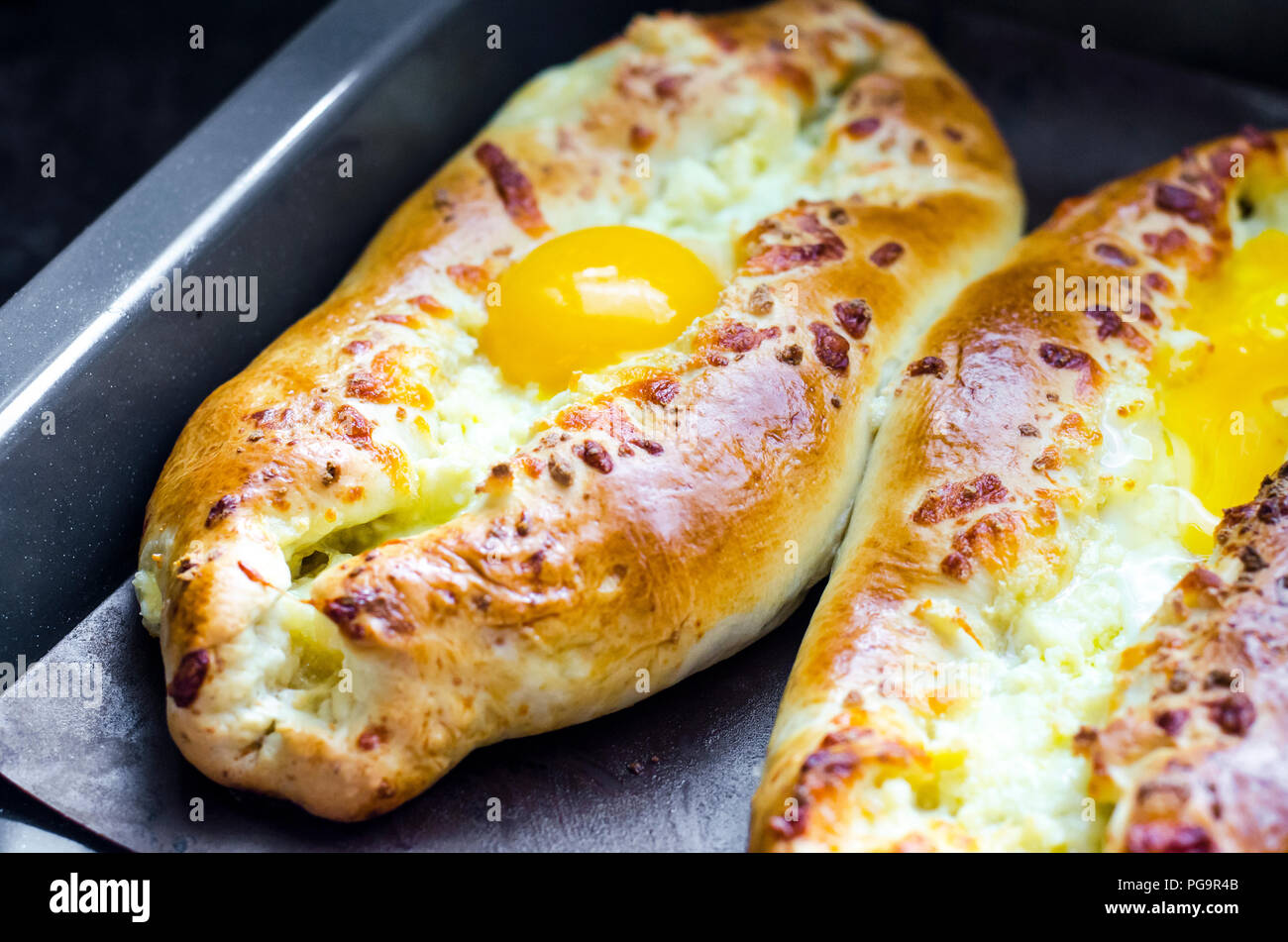Adjarian khachapuri. traditional national cheese bread with