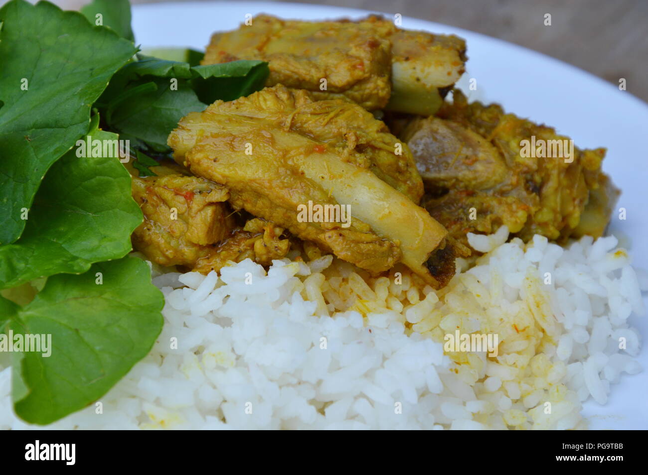 curry pork bone on rice Stock Photo Alamy