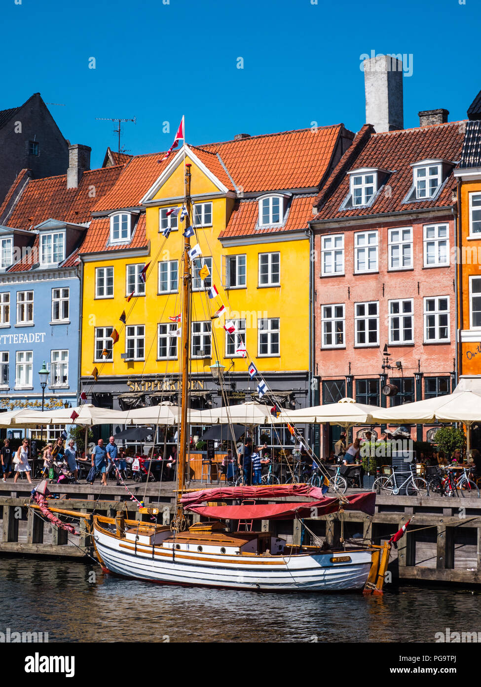 Nyhavn Canal with Traditional Boats, Copenhagen, Zealand, Denmark, Europe. Stock Photo