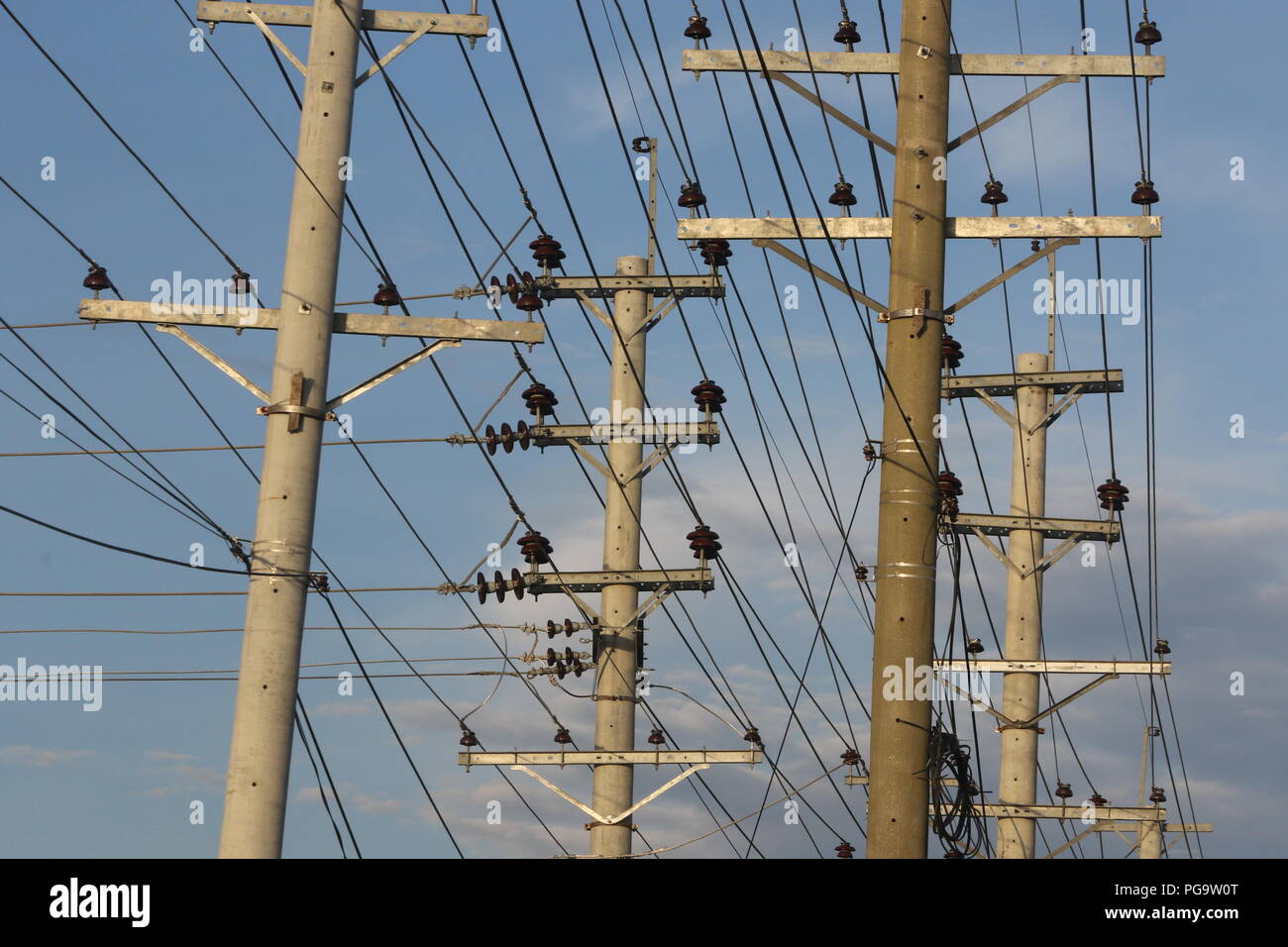 Electrical power lines hang from transmission pylons in Dhaka Stock