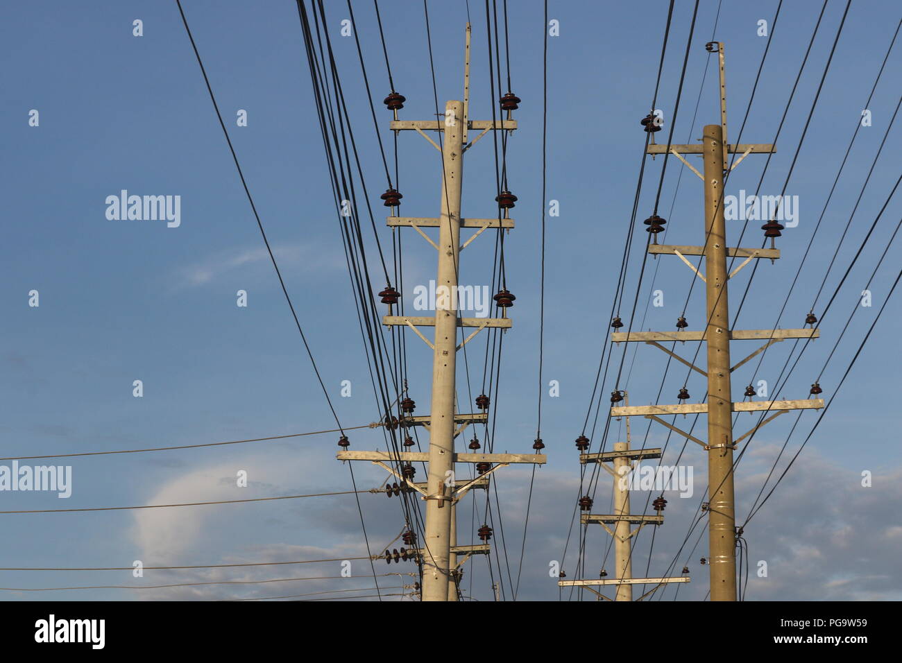 Electrical power lines hang from transmission pylons in Dhaka Stock