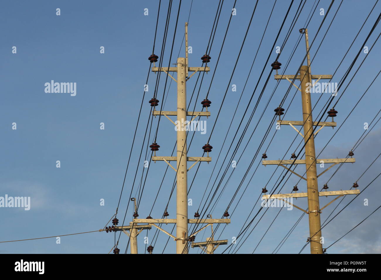Electrical power lines hang from transmission pylons in Dhaka Stock