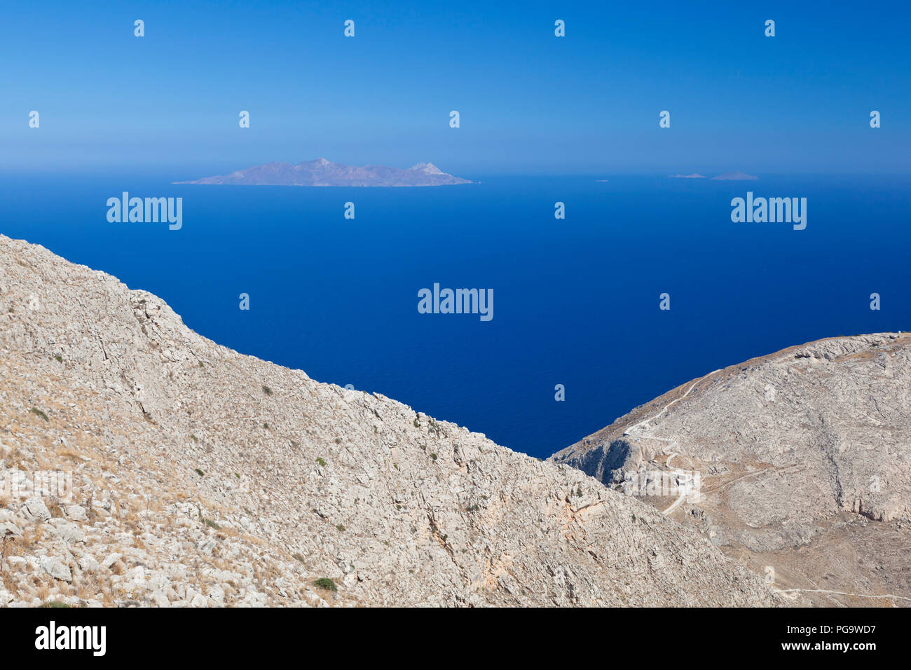 View from halfway up to the Profitis Ilias to the island Anafi. Stock Photo