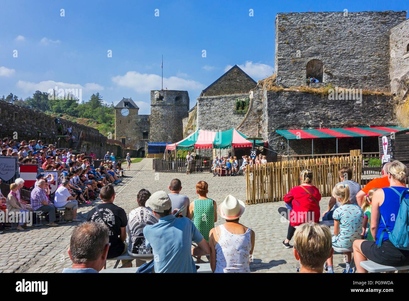 Tourists watching falconry / bird of prey show in the Château de Bouillon Castle, Luxembourg Province, Belgian Ardennes, Belgium Stock Photo