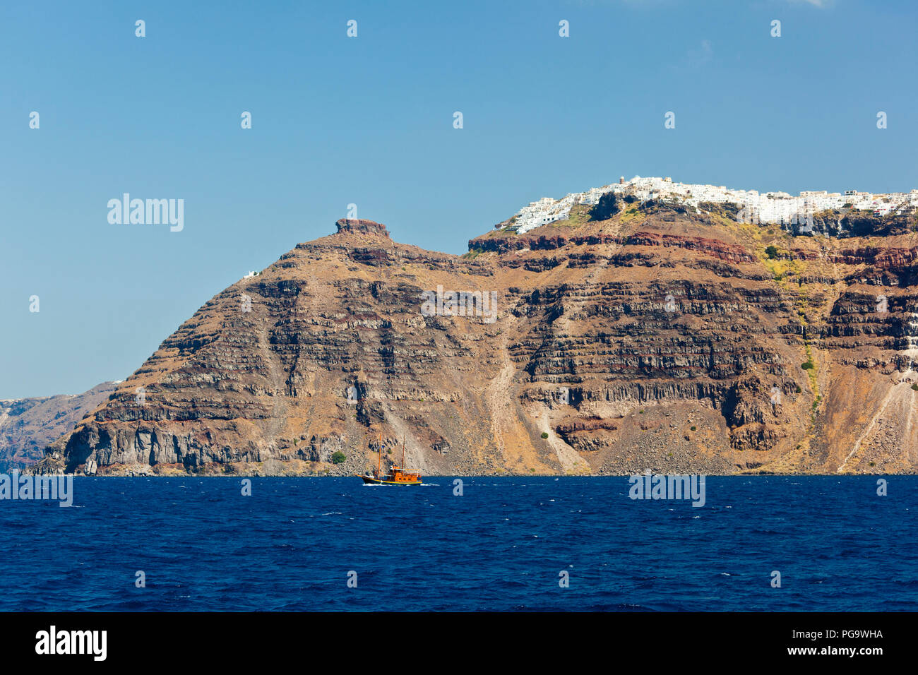 View from a boat to the village of Imerovigli in Santorini, Greece. Stock Photo