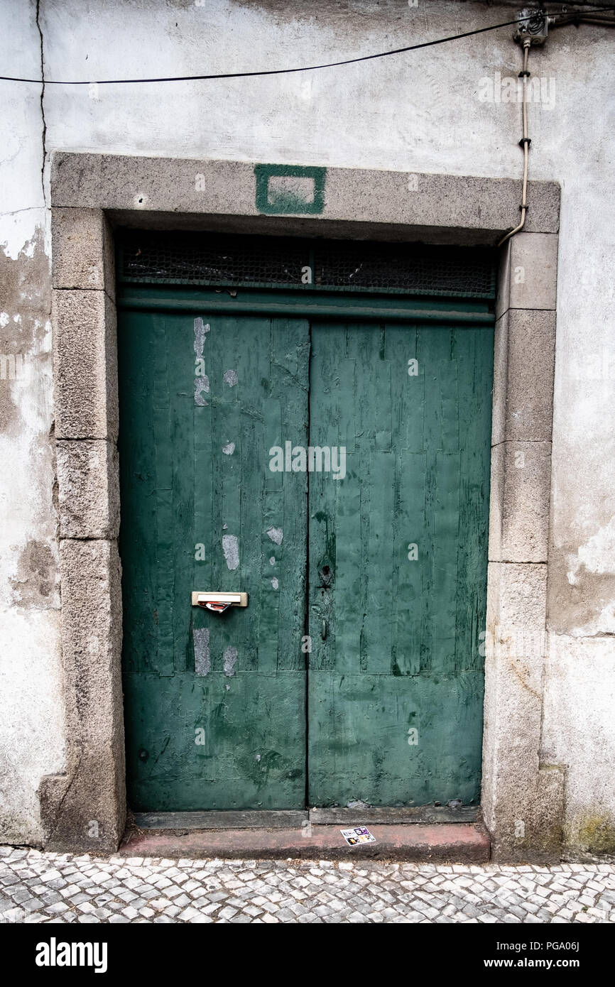 old abandoned buildings and doors in bad conditions at the moment, waiting for investment Stock Photo