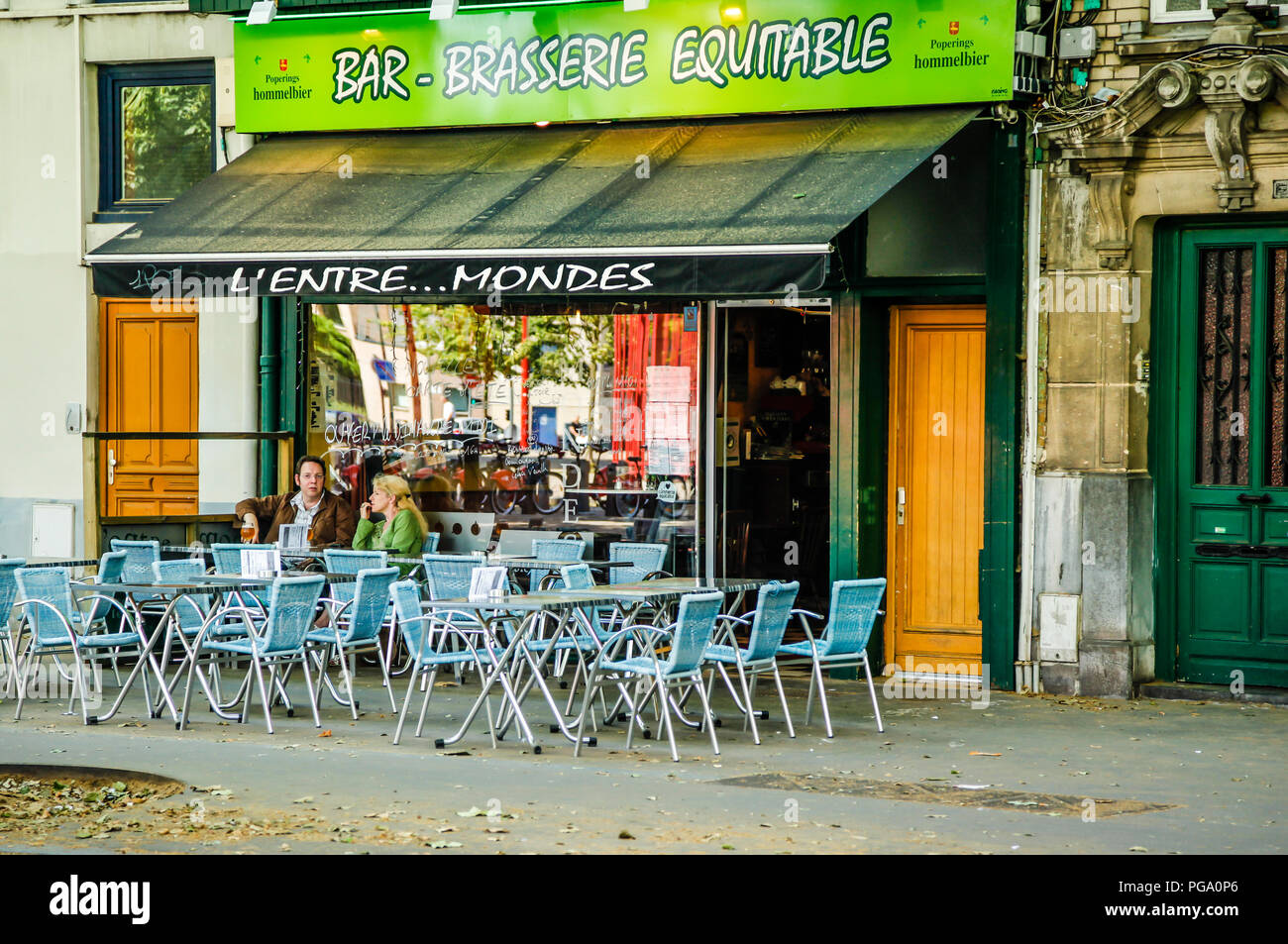 People outside the cafe L'entre Mondes at Boulevard Jean Baptiste Lebas in  Lille France Stock Photo - Alamy