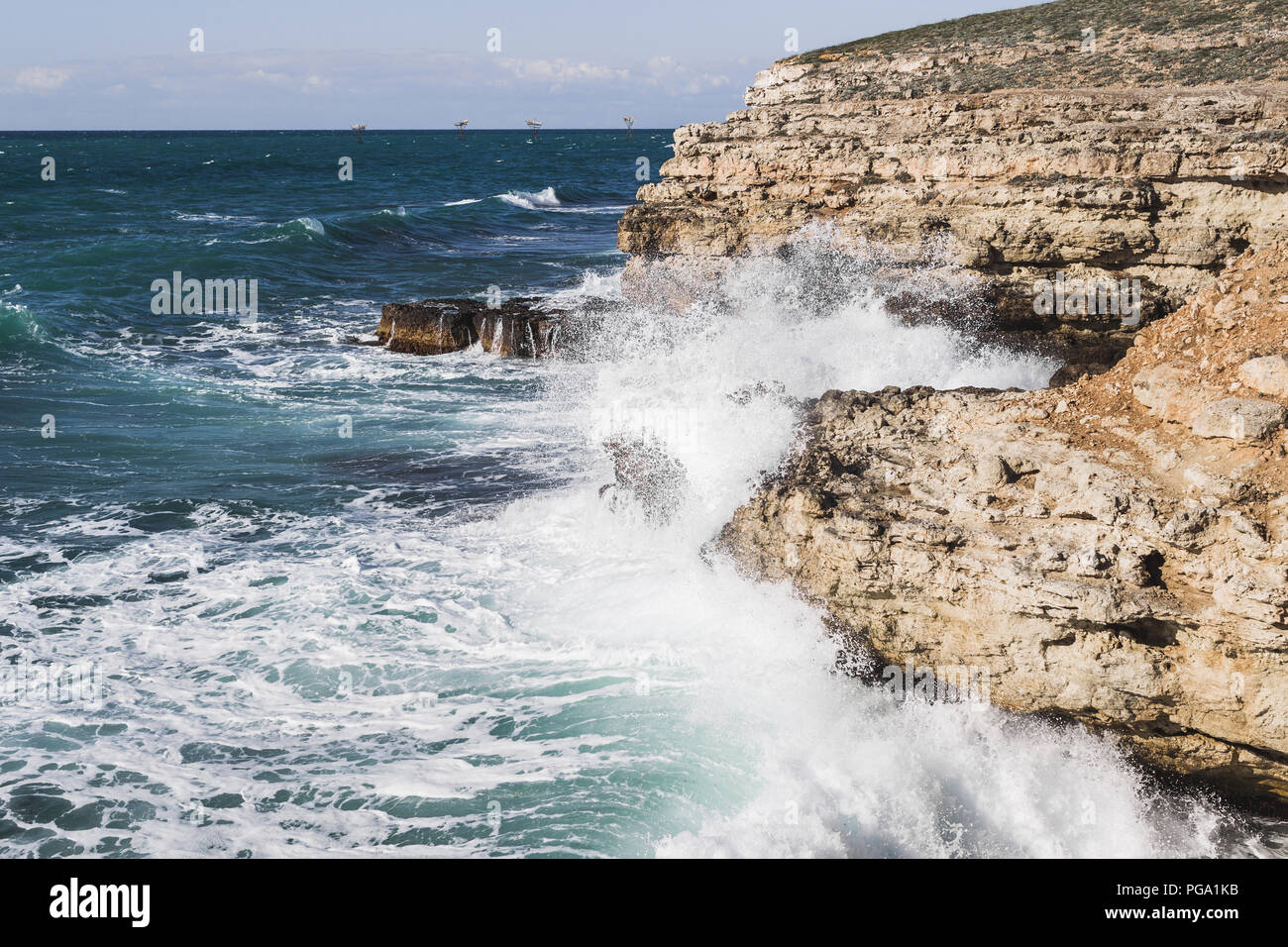 Coast Tarhankut in Crimea. Big waves breaking on the rocky coast Stock Photo