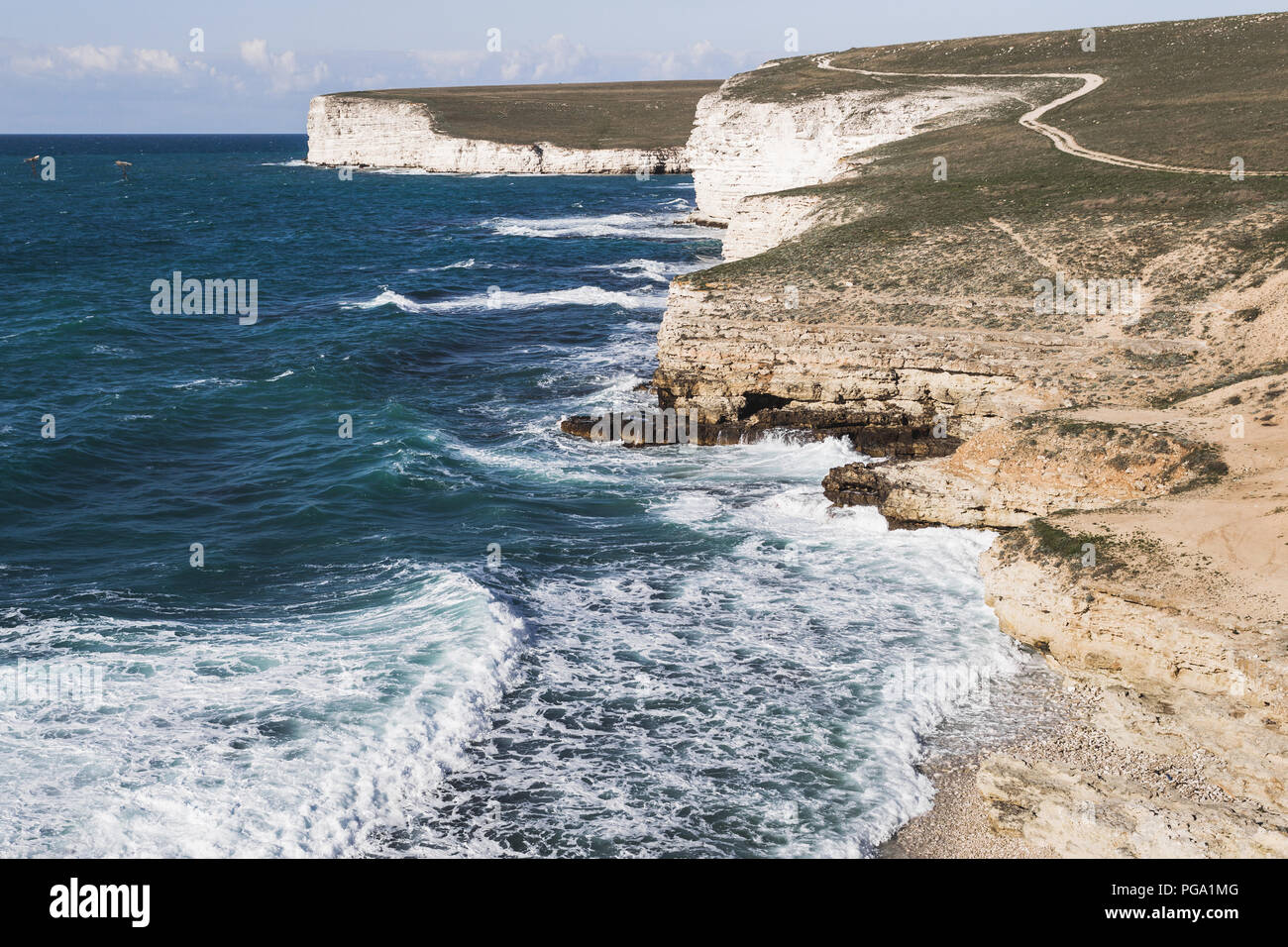 Coast Tarhankut in Crimea. Big waves breaking on the rocky coast Stock Photo
