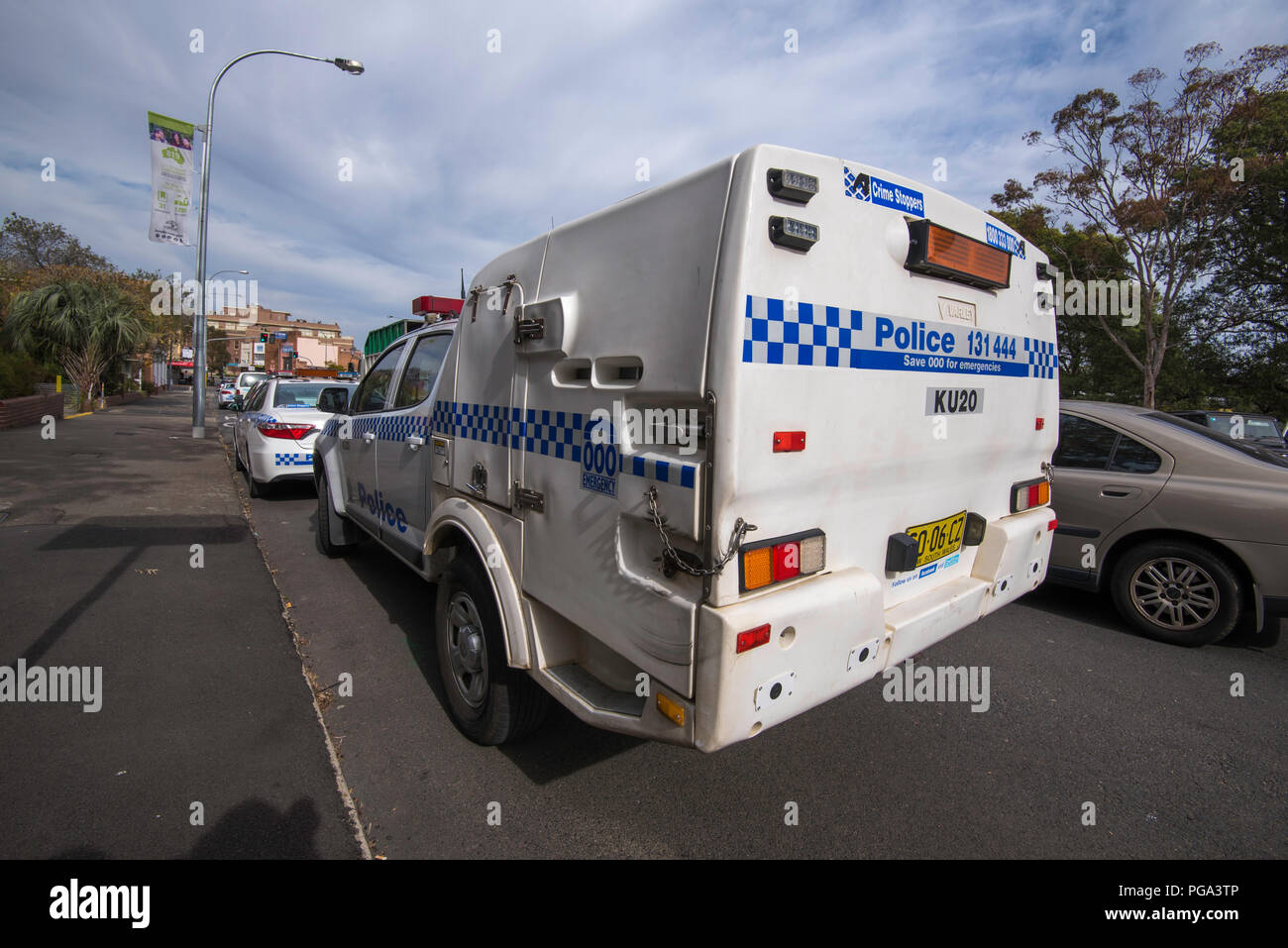 July 2018, The rear view of  a New South Wales police paddy wagon (patrol van) on the street outside Hornsby courthouse in New South Wales, Australia Stock Photo