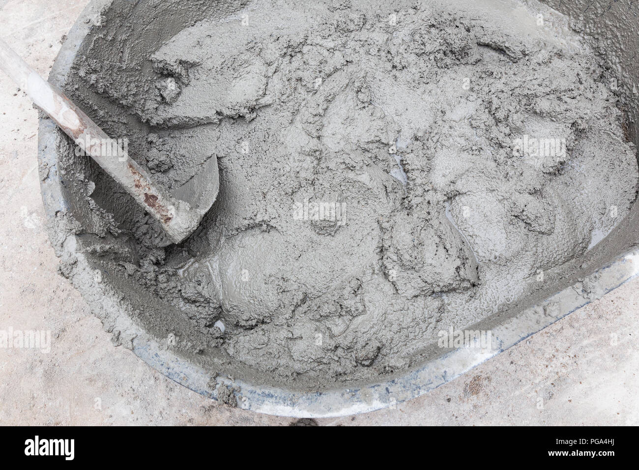 Mixed mortar cement in container ready to be used Stock Photo Alamy