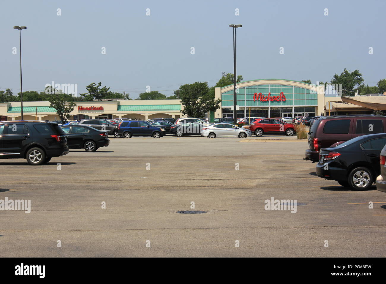 Standard strip mall shopping center in suburban Niles, Illinois, USA on