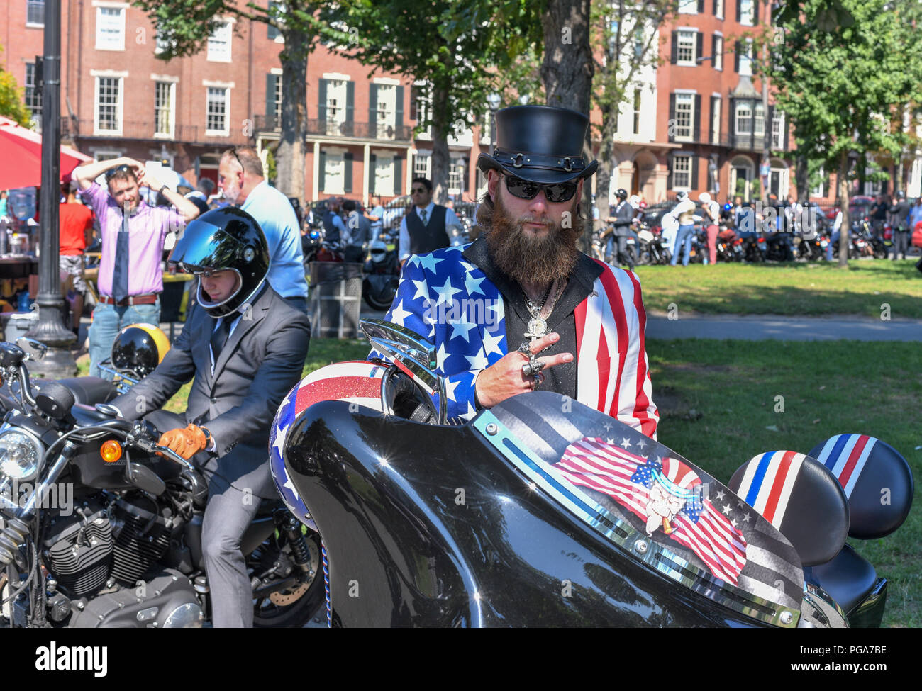Biker in top hat and Stars and Stripes at Boston Common car show Massachusetts Stock Photo